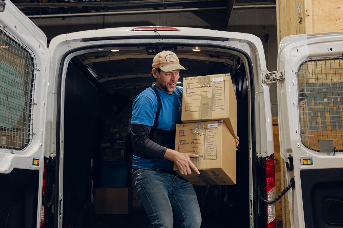 Labeled inventory boxes loaded for transport